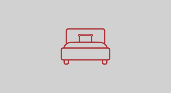 Suíte de solteiro com cama de casal