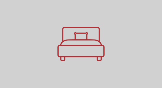 Suíte de solteiro com cama de casal